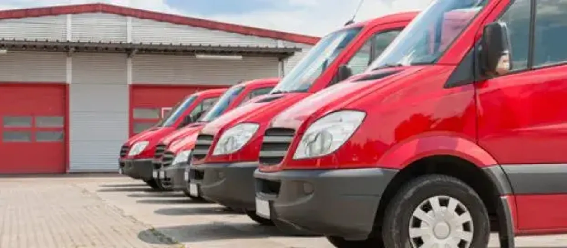 Red vans lined up