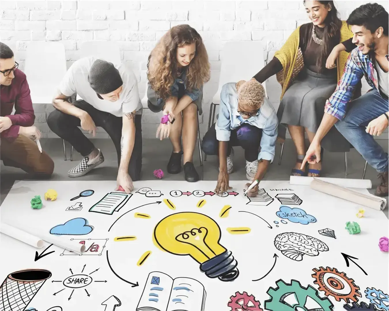 Group of people drawing a brainstorm diagram