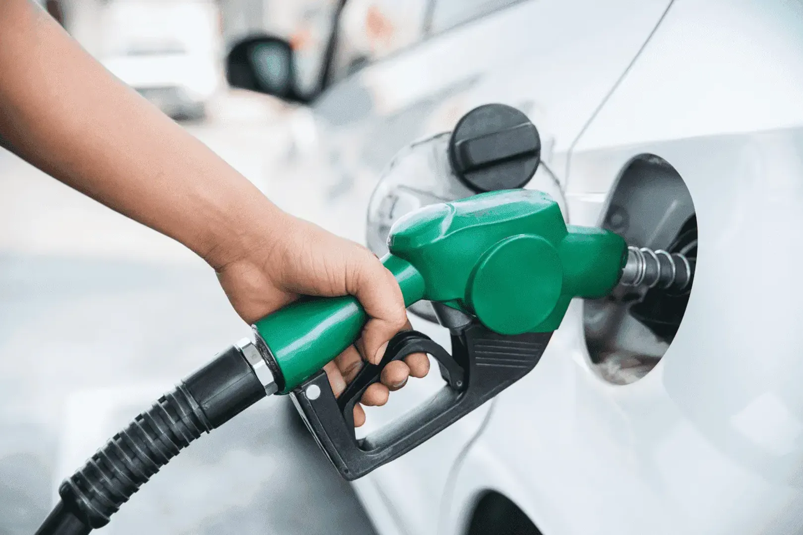 Car being filled at petrol station